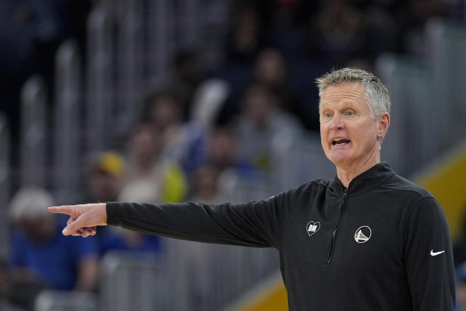 Golden State Warriors head coach Steve Kerr gestures during the first half of an NBA basketball game against the Denver Nuggets, Sunday, Feb. 25, 2024, in San Francisco. (AP Photo/Godofredo A. Vásquez)