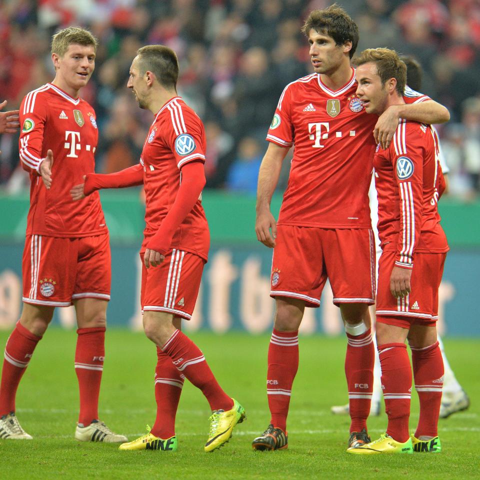 Munich's Toni Kroos, Franck Ribery of France, Javier Martinez of Spain and Mario Goetze, from left, celebrate after scoring during the German soccer cup, DFB Pokal, semifinal soccer match between FC Bayern Munich and FC Kaiserslautern in the Allianz Arena in Munich, Germany, on Wednesday, April 16. 2014. Bayern won 5-1. (AP Photo/Kerstin Joensson)