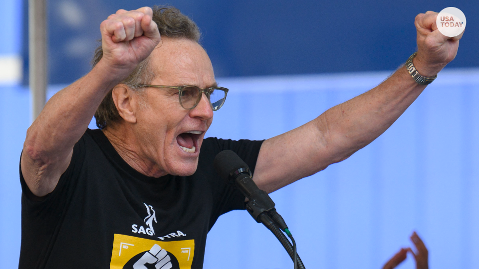 Byan Cranston speaks out against AI at a rally in support of the SAG-AFTRA strike.