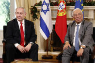 Israeli Prime Minister Benjamin Netanyahu, left, and Portuguese Prime Minister Antonio Costa meet at the Sao Bento palace in Lisbon Thursday, Dec. 5, 2019. (AP Photo/Armando Franca)