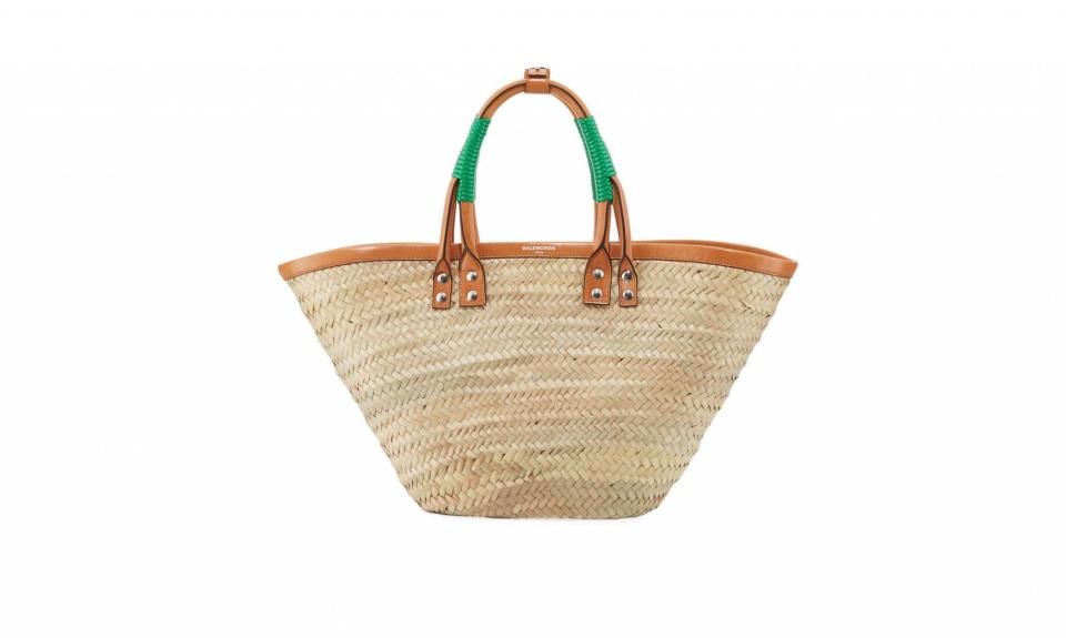 <p>Bistro Panier Small Straw Tote Bag, $1,135, <a rel="nofollow noopener" href="http://www.neimanmarcus.com/Balenciaga-BISTROT-PANIER-M-STRAW/prod196280082/p.prod?ecid=NMCS__Polyvore&utm_medium=CSE&utm_source=NMCS__Polyvore" target="_blank" data-ylk="slk:neimanmarcus.com;elm:context_link;itc:0;sec:content-canvas" class="link ">neimanmarcus.com</a> </p>