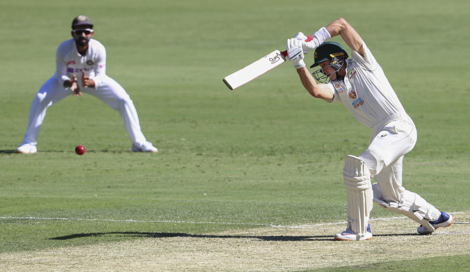 Australia's Marnus Labuschagne bats during play on the first day of the fourth cricket test between India and Australia at the Gabba, Brisbane, Australia, Friday, Jan. 15, 2021. (AP Photo/Tertius Pickard)