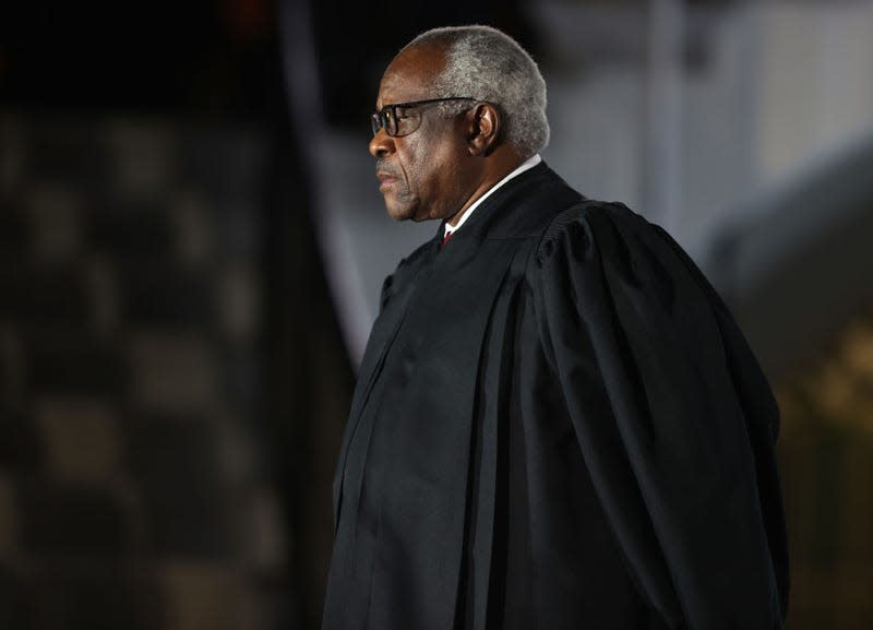 WASHINGTON, DC - OCTOBER 26: Supreme Court Associate Justice Clarence Thomas attends the ceremonial swearing-in ceremony for Amy Coney Barrett to be the U.S. Supreme Court Associate Justice on the South Lawn of the White House on October 26, 2020, in Washington, DC. The Senate confirmed Barrett’s nomination to the Supreme Court today by a vote of 52-48