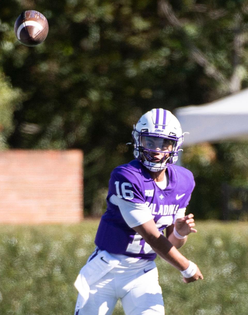 Furman Paladins quarterback Jace Wilson (16) throws the ball while playing against East Tennessee State at Paladin Stadium, Saturday, October 23, 2021. 