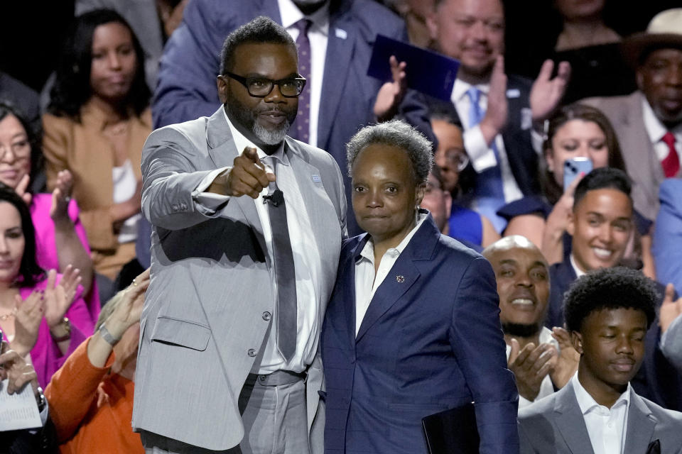 Chicago Mayor-elect Brandon Johnson, acknowledges out-going Mayor Lori Lightfoot, during his inauguration as the city's 57 mayor Monday, May 15, 2023, in Chicago. (AP Photo/Charles Rex Arbogast)