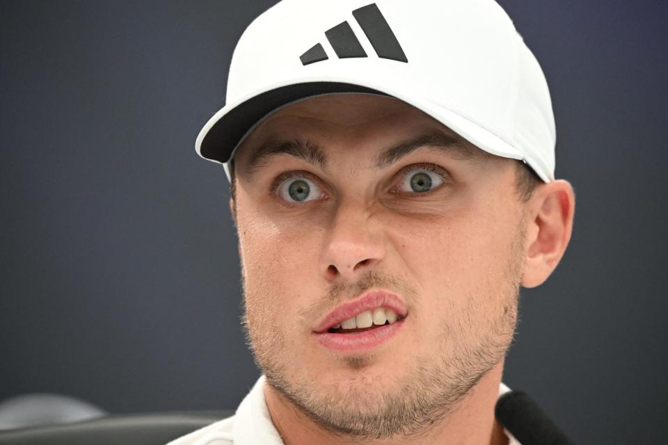 Sweden's Ludvig Aberg gestures during a press conference held ahead of the 152nd British Open Golf Championship at Royal Troon on the south west coast of Scotland on July 15, 2024. (Photo by ANDY BUCHANAN/AFP via Getty Images)