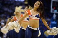 May 6, 2016; Oklahoma City, OK, USA; Members of the Oklahoma City Thunder dance team entertain fans during a break in action against the San Antonio Spurs in game three of the second round of the NBA Playoffs at Chesapeake Energy Arena. Mandatory Credit: Mark D. Smith-USA TODAY Sports