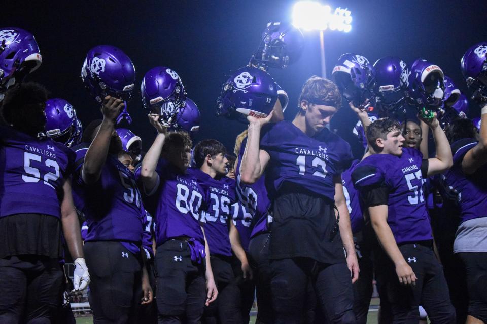 East Stroudsburg South football players raise their helmets after their game against Liberty in East Stroudsburg on Friday, Aug. 27, 2021. South lost, 24-16.