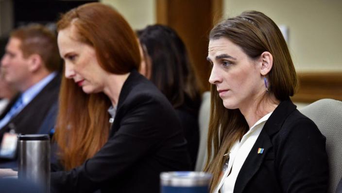 Zooey Zephyr, right, attends a legislative training session at the state Capitol in Helena, Mont., on Nov. 16, 2022.