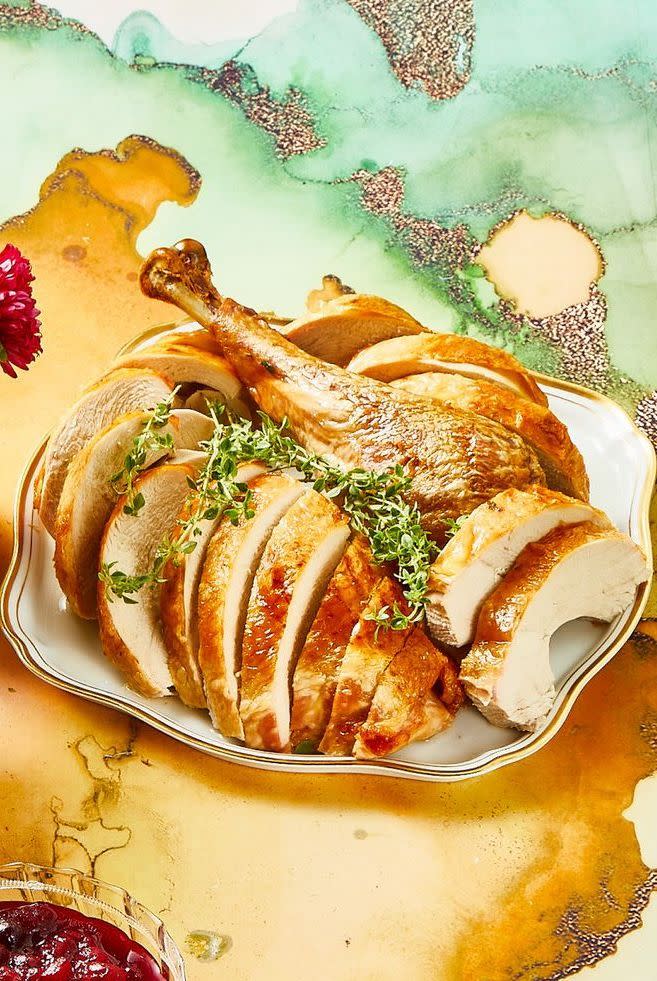 <p>Say goodbye to the mentality that turkey is reserved for Thanksgiving, and say hello to this woodsy roast that'll give you plenty of leftovers for the rest of the week. </p><p><em><a href="https://www.womansday.com/food-recipes/food-drinks/recipes/a11790/herb-roasted-turkey-recipe-124681/" rel="nofollow noopener" target="_blank" data-ylk="slk:Get the Thyme- and Sage-Roasted Turkey recipe.;elm:context_link;itc:0;sec:content-canvas" class="link ">Get the Thyme- and Sage-Roasted Turkey recipe.</a></em></p>