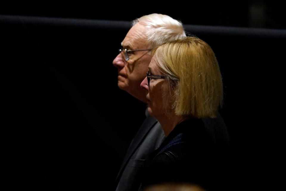 Kathy Cade, a longtime aide to former U.S. first lady Rosalynn Carter, pauses at her casket at the Jimmy Carter Presidential Library and Museum in Atlanta on Nov. 27.  / Credit: Brynn Anderson/Pool via REUTERS