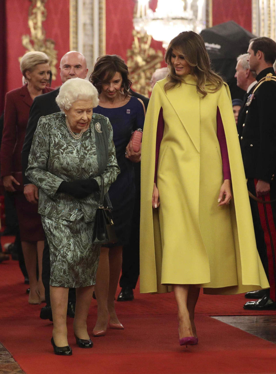 Photo by: KGC-512/STAR MAX/IPx 2019 12/3/19 The Queen, accompanied by other Members of the Royal Family, hosts a reception for NATO leaders, spouses or partners, and delegations, at Buckingham Palace in London, England. Here, Queen Elizabeth, Melania Trump