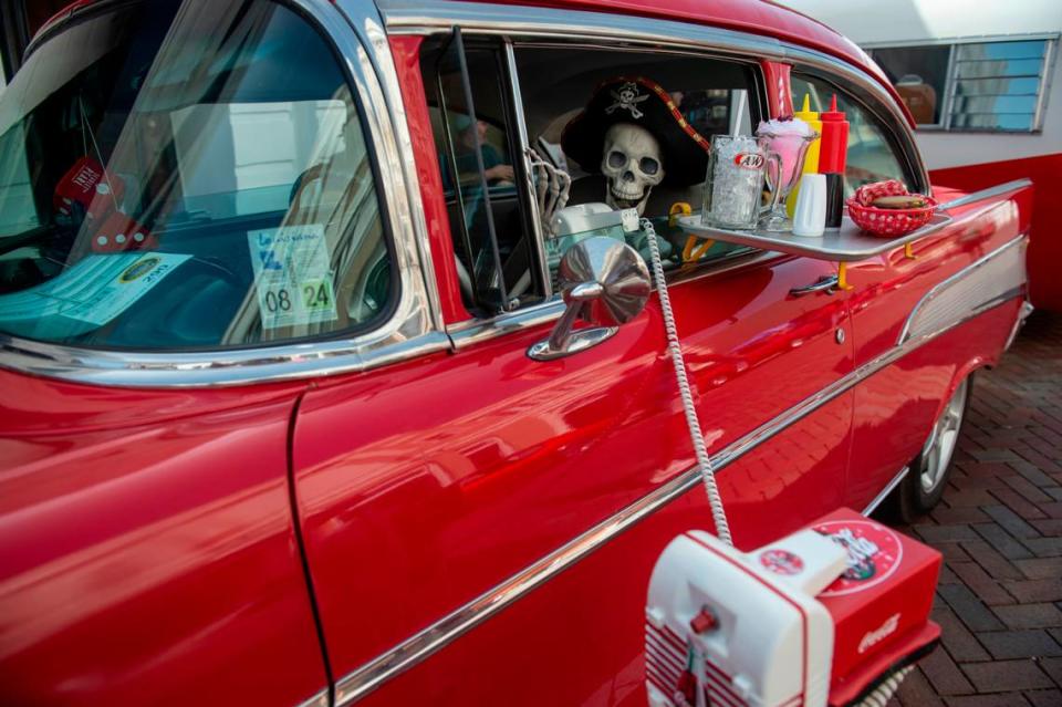 A plastic pirate skeleton sits in the driver’s seat of a classic cars parked in downtown Biloxi during the Biloxi Block Party, one of many Cruisin’ the Coast events, on Wednesday, Oct. 4, 2023.