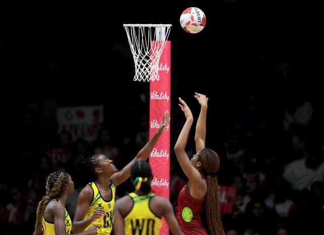 England's Olivia Tchine scores during the Vitality Netball International Series match against Jamaica on Sunday (Bradley Collyer/PA).