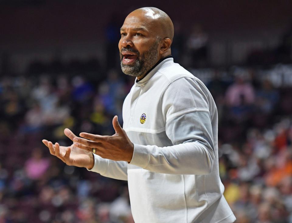 Derek Fisher argues a call during a game in May.