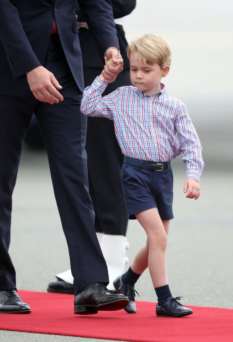 Prince George appeared in a colourful stripy outfit [Photo: PA]