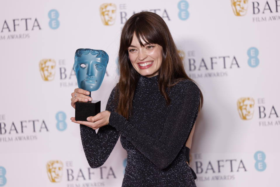 Emma Mackey, winner of the EE rising star award, poses for photographers at the 76th British Academy Film Awards, BAFTA's, in London, Sunday, Feb. 19, 2023. (Photo by Vianney Le Caer/Invision/AP)