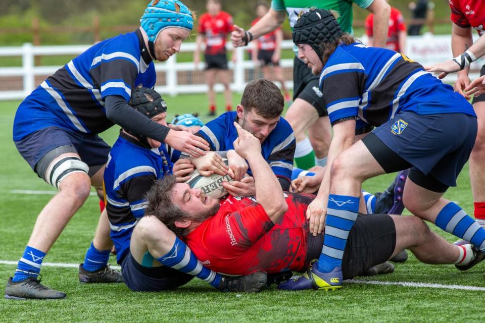 Baildon's No 8 Dan Cookson is held up over the Yarnbury line. Photo credit: Mick Massey