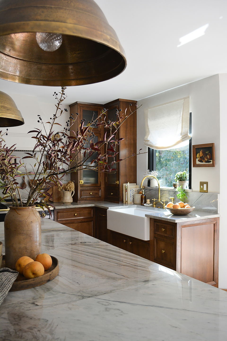 a kitchen with a chandelier