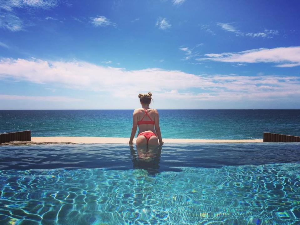 <p>Ashley lives her best vacation life by putting her "<a rel="nofollow noopener" href="https://www.instagram.com/p/BEgye4XwaKn/" target="_blank" data-ylk="slk:bunz;elm:context_link;itc:0;sec:content-canvas" class="link ">bunz</a>" on display in the pool.</p>