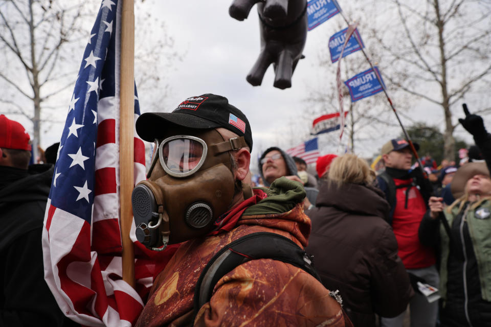 WASHINGTON, DC - JANUARY 06: Trump supporters gather outside the U.S. Capitol building following a "Stop the Steal" rally on January 06, 2021 in Washington, DC. A pro-Trump mob stormed the Capitol earlier, breaking windows and clashing with police officers. Trump supporters gathered in the nation's capital to protest the ratification of President-elect Joe Biden's Electoral College victory over President Donald Trump in the 2020 election. (Photo by Spencer Platt/Getty Images)