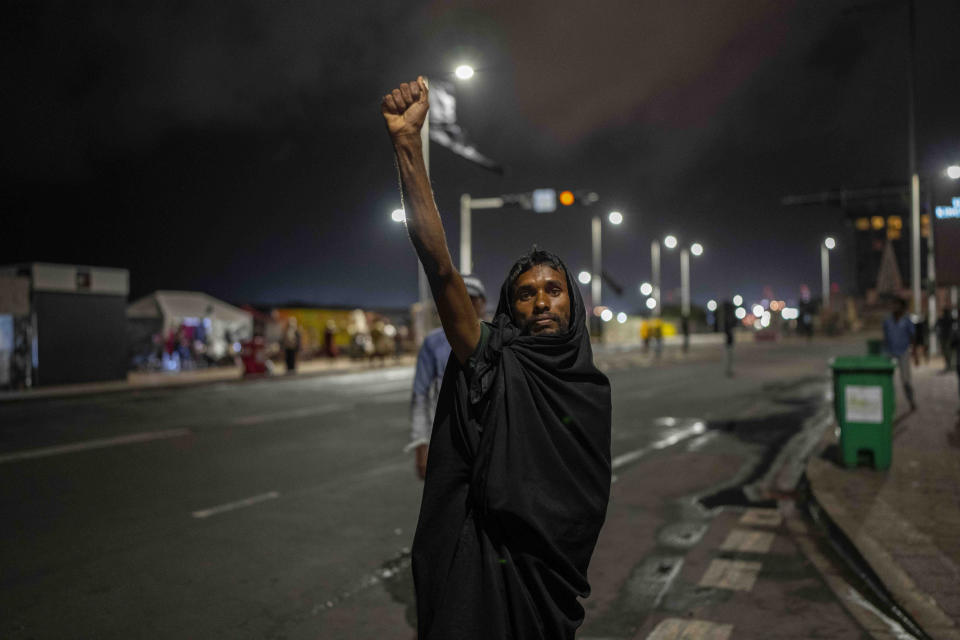 A protester shouts slogans at the site of a protest camp outside the Presidential Secretariat in Colombo, Sri Lanka, Friday, July 22, 2022. (AP Photo/Rafiq Maqbool)
