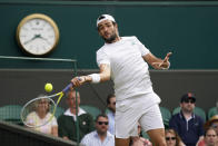 Italy's Matteo Berrettini plays a return to Poland's Hubert Hurkacz during the men's singles semifinals match on day eleven of the Wimbledon Tennis Championships in London, Friday, July 9, 2021. (AP Photo/Alberto Pezzali)