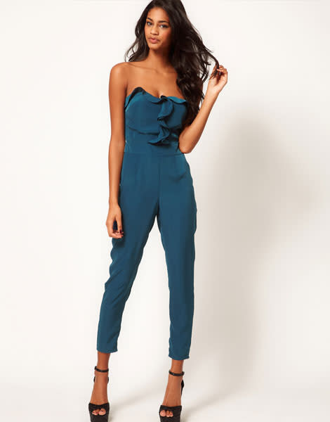 <b><a href="http://www.asos.com/ASOS/ASOS-Bandeau-Jumpsuit-With-Frill-Front/Prod/pgeproduct.aspx?iid=2418976&cid=0" rel="nofollow noopener" target="_blank" data-ylk="slk:Bandeau Jumpsuit With Frill Front - £50 - ASOS;elm:context_link;itc:0;sec:content-canvas" class="link ">Bandeau Jumpsuit With Frill Front - £50 - ASOS</a><br></b><br>This teal jumpsuit would look great on olive complexions teamed with gold accessories.