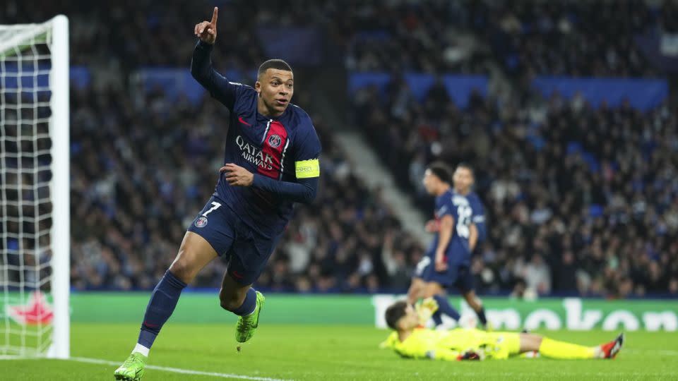 Mbappé celebrates scoring against Real Sociedad in the Champions League. - Alex Caparros/Getty Images