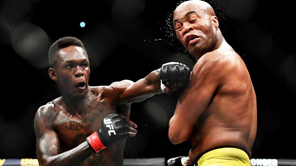 Israel Adesanya punches Anderson Silva. (Photo by Quinn Rooney/Getty Images)