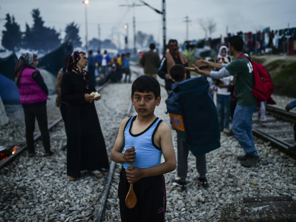 Refugees in the Greek village of Idomeni. There are warnings that refugees stranded in the country will lose legal safeguards: AFP