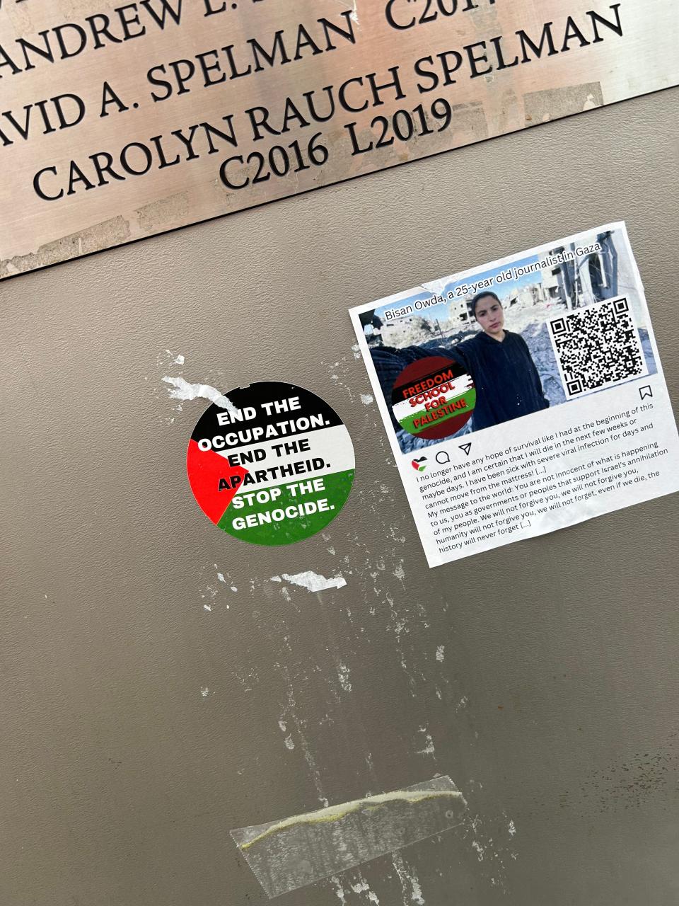 Stickers on the University of Pennsylvania's Locust Walk show support for Palestinians.
