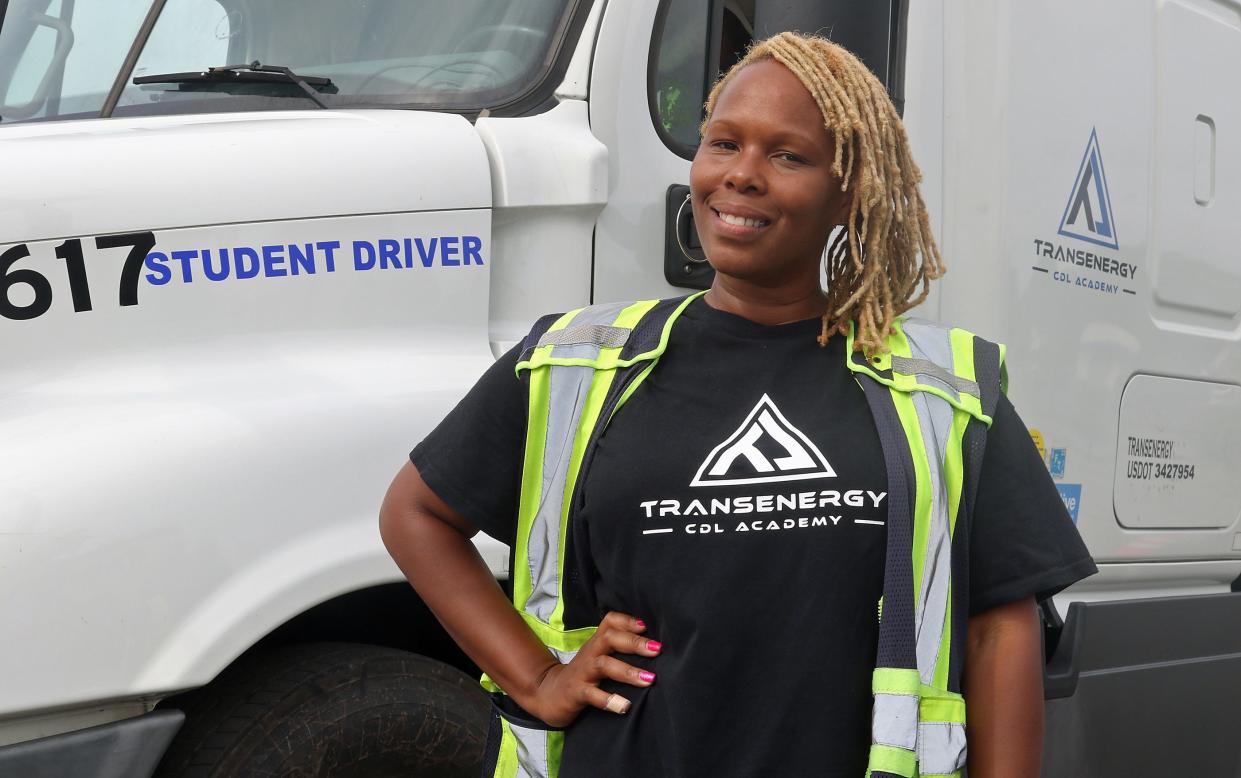 Owner Narria Philpott of Transenergy CDL Academy poses in the parking area at the Eastridge Mall Monday morning, Aug. 22, 2022.