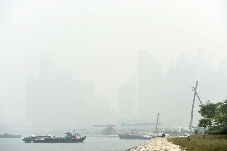 Buildings in Singapore's Shenton way business district are blanketed with thick smog, on September 24, 2015