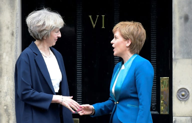 British Prime Minister Theresa May (left) is due to hold talks with Scottish First Minister Nicola Sturgeon to try to avert Scotland's new independence bid