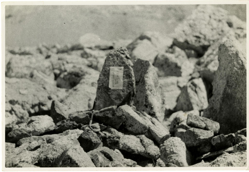 This 1945 photo provided by the Matsumura family via the National Park Service shows the gravesite of Giichi Matsumura following his burial after he died on Mount Williamson during his incarceration at an internment camp for people of Japanese ancestry in Manzanar, Calif., during World War II. A skeleton found by hikers this fall near California's second-highest peak was identified Friday, Jan. 3, 2020, as Matsumura, a Japanese American artist who had left the Manzanar internment camp to paint in the mountains in the waning days of World War II. (Matsumura Family/National Park Service via AP)