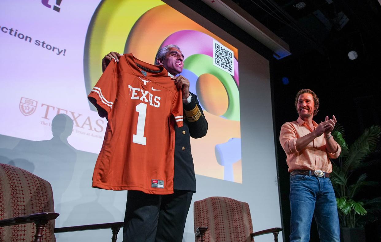 Dr. Vivek Murthy, the U.S. surgeon general, received a UT football jersey with his name on the back after Wednesday's talk at the university about the importance of social connection to mental and physical well-being.