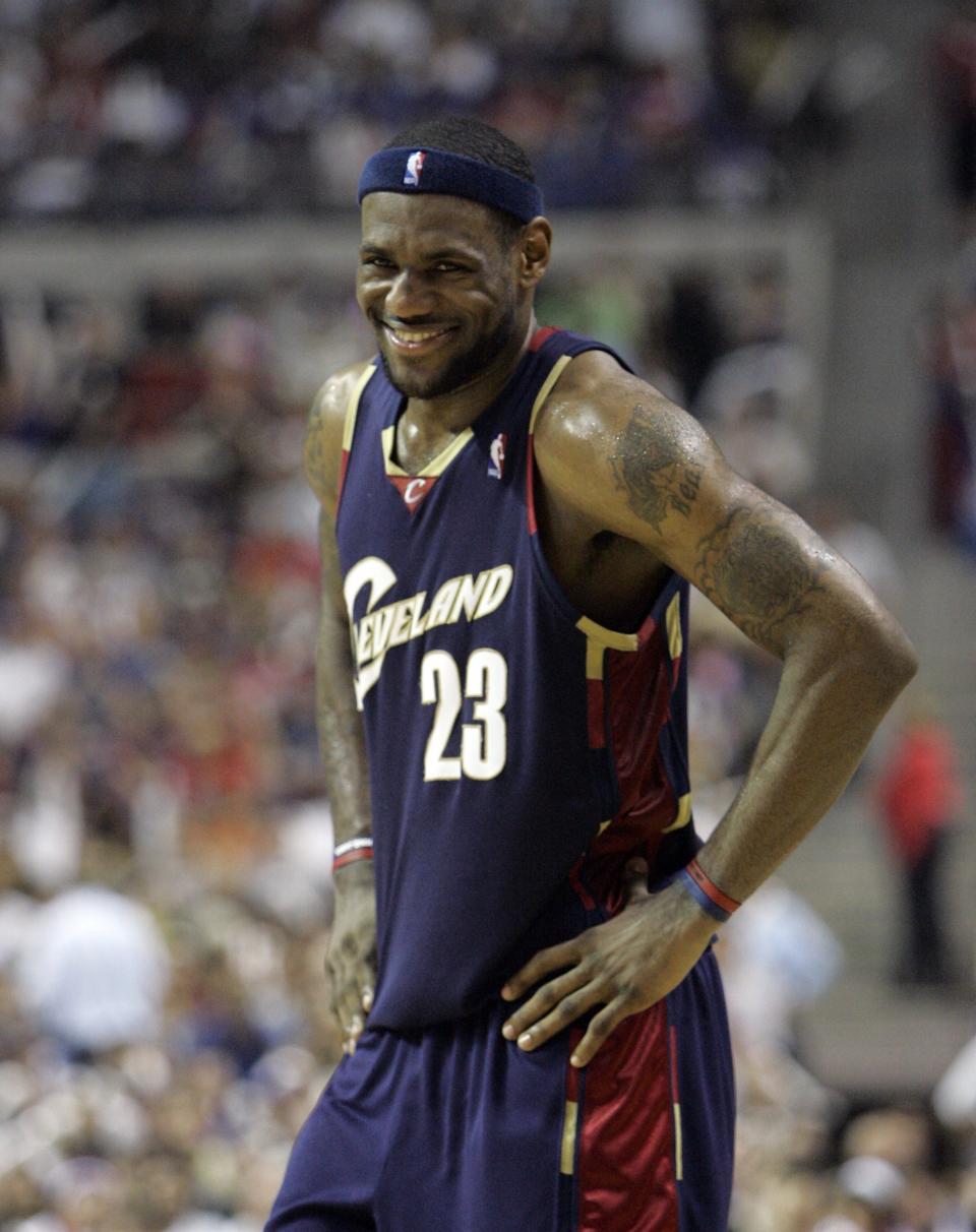 FILE -Cleveland Cavaliers forward LeBron James smiles during the first overtime period of Game 5 of the NBA Eastern Conference basketball finals against the Detroit Pistons at the Palace of Auburn Hills, Mich., Thursday, May 31, 2007. LeBron James is about to pass Kareem Abdul-Jabbar as the NBA's career scoring leader. The AP is looking back at some of his top games along the way.(AP Photo/Paul Sancya, File)