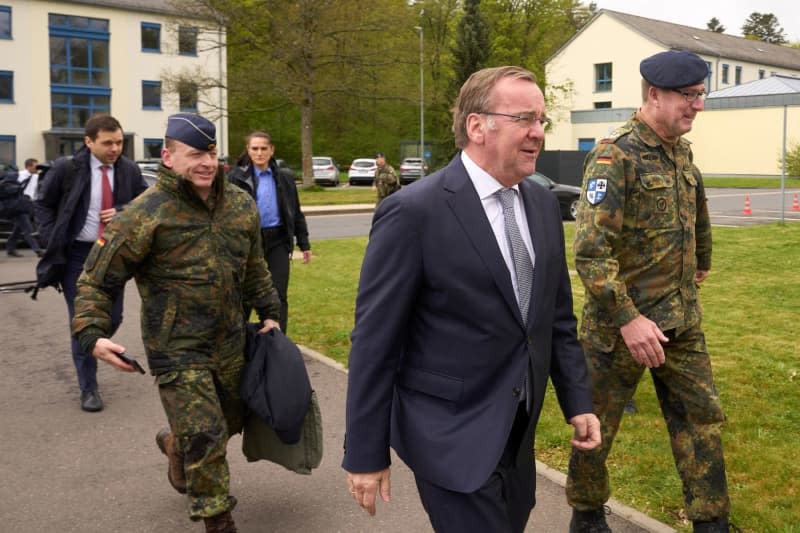 German Minister of Defense Boris Pistorius visits the Operative Communications Centre and welcomed by Commander Colonel Ferdi Akaltin (R). Thomas Frey/dpa