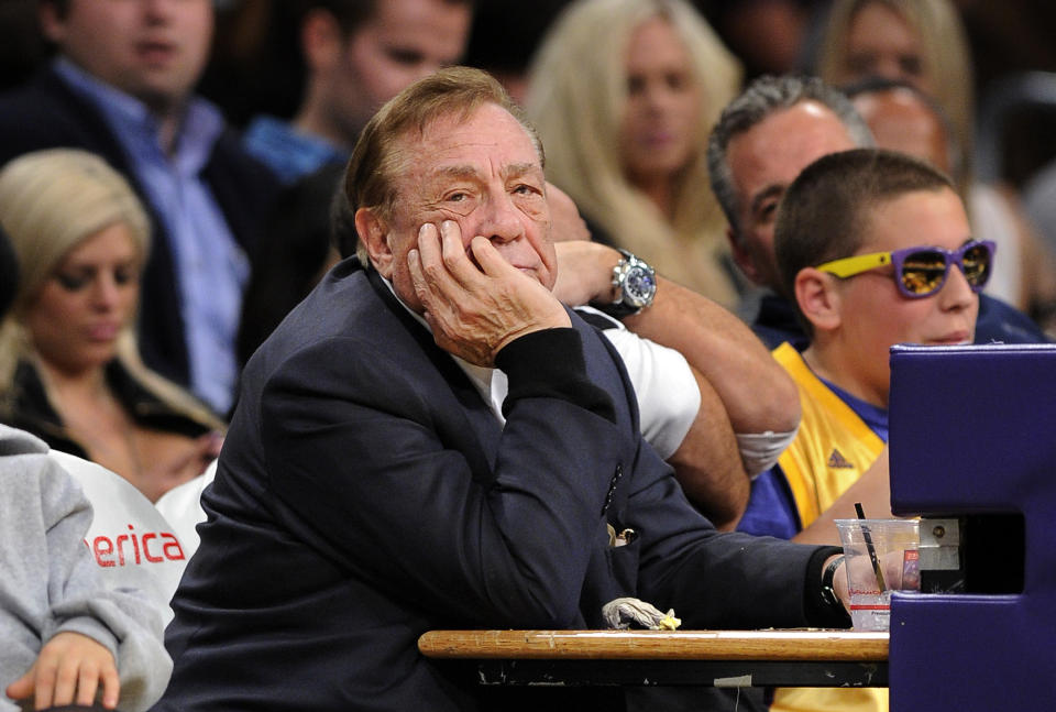 FILE - In this Feb. 25, 2011, file photo, Los Angeles Clippers owner Donald Sterling looks on during the first half of their NBA basketball game against the Los Angeles Lakers in Los Angeles. NBA Commissioner Adam Silver has banned Sterling for life and fined him $2.5 million for making racist comments. (AP Photo/Mark J. Terrill, File)