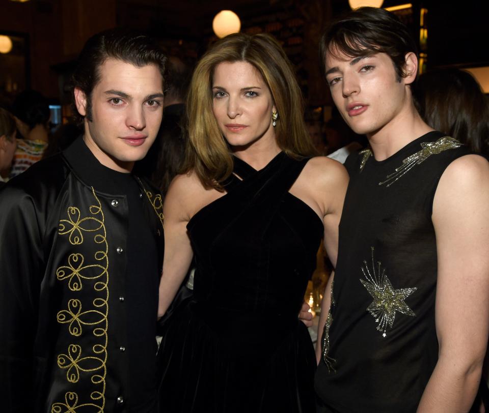 Harry, right, with mother Stephanie Seymour, centre, and brother Peter Brant, leftGetty Images