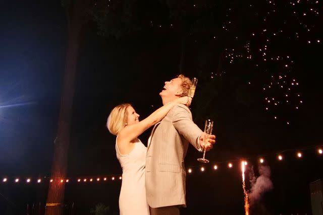 <p>B. Sean Fairburn</p> Alicia Allain and John Schneider dance on their wedding day