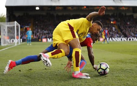 Britain Football Soccer - Crystal Palace v Burnley - Premier League - Selhurst Park - 29/4/17 Burnley's Andre Gray in action with Crystal Palace's Wilfried Zaha Reuters / Stefan Wermuth Livepic