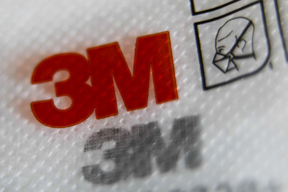 3M logos are seen on a face mask and its packaging in this illustration photo taken in Krakow, Poland on January 11, 2022. (Photo by Jakub Porzycki/NurPhoto via Getty Images)