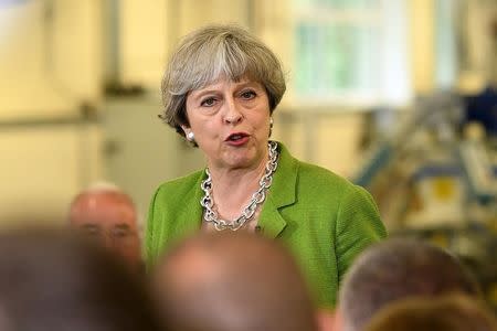 Britain's Prime Minister Theresa May speaks during a Q&A at Cross Manufacturing Company in Odd Down in Bath, Britain, May 31, 2017. REUTERS/Leon Neal/Pool