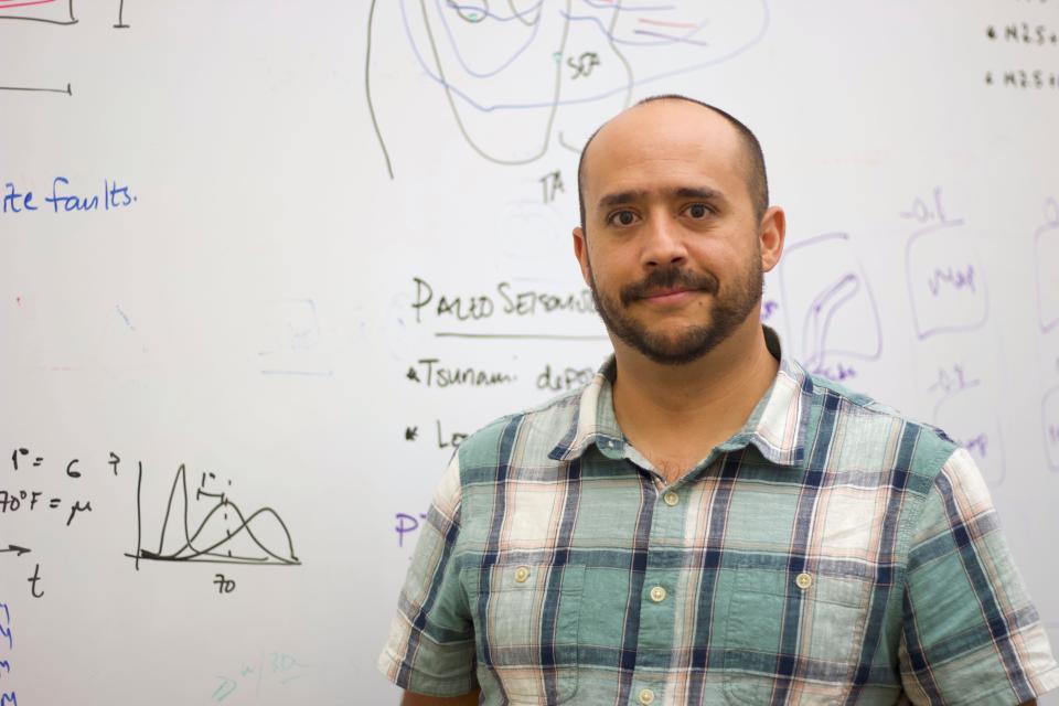 Diego Melgar Moctezuma, associate professor of earth sciences at the University of Oregon and the director of the new Cascadia Region Earthquake Science Center, poses in his office on Oct. 18, 2023.