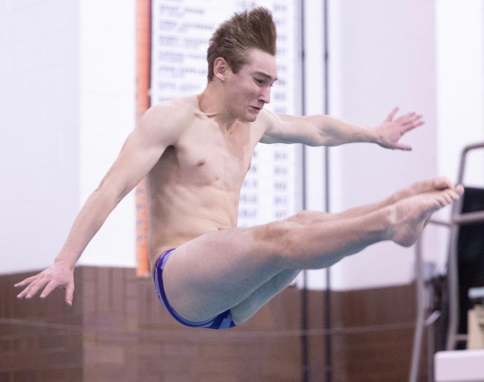 Levi Hellman of Jackson competes in the OHSAA Division I state diving championships at C.T. Branin Natatorium, Feb. 20, 2024.
