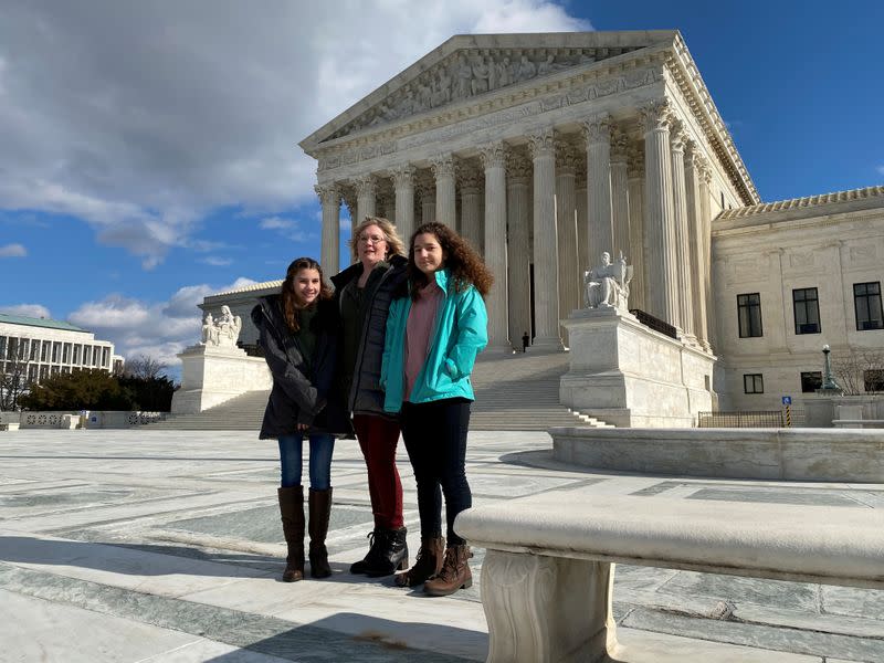 FILE PHOTO: Montana resident Kendra Espinoza, a key plaintiff in a major religious rights case to be argued before the U.S. Supreme Court, poses in front of the building in Washington