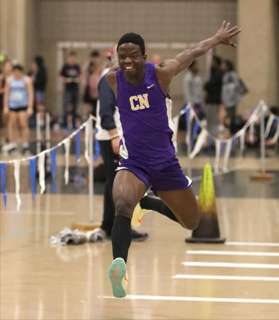 Victor Oduwegwu from Clarkstown North High School competes in the boys triple jump during the Suffern Invitational Track and Field meet at Rockland Community College in Suffern, Jan. 13, 2023.