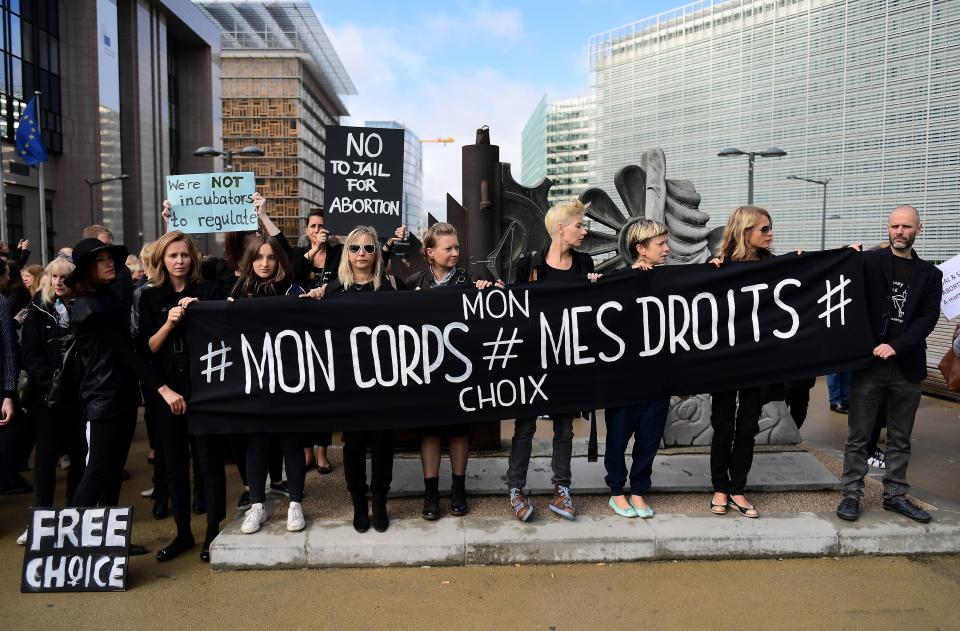 Men and women hold a banner that says, "My Body, My Rights" in Brussels to show support for the Black Monday protests.&nbsp;